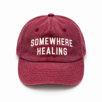 Somewhere Healing Cap — Burgundy flat lay on white